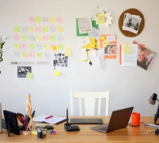 Home based business workspace with laptop, desk setup and work from home environment