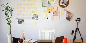 Home based business workspace with laptop, desk setup and work from home environment