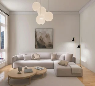 Modern living room with curved sofa, neutral tones and minimalist decor representing 2026 interior design trends