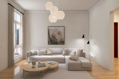 Modern living room with curved sofa, neutral tones and minimalist decor representing 2026 interior design trends