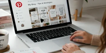 Pinterest marketing strategy for bloggers displayed on a laptop workspace with blog planning notes