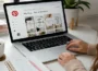 Pinterest marketing strategy for bloggers displayed on a laptop workspace with blog planning notes